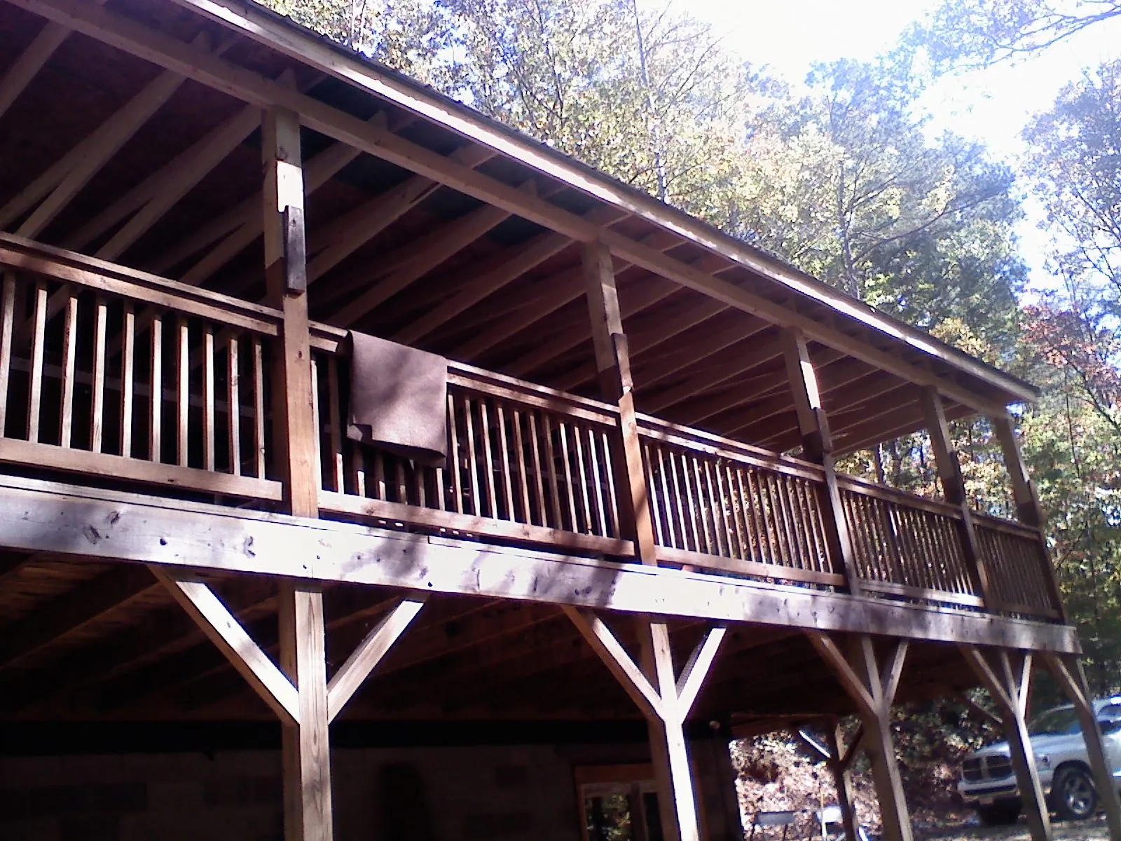 Timber framing under a new elevated porch and deck — Roof Leak Repair in University by Roofing Brothers